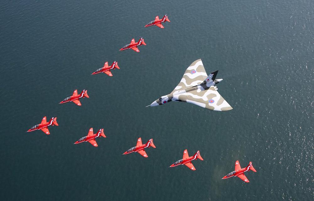 Click image for larger version

Name:	Red Arrows Farewell To Vulcan.jpg
Views:	575
Size:	113.6 KB
ID:	363539