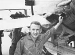 Lt. Graben stand behind the left stab of his F-105, damage by flak over Laos.