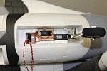 Upgraded nose gear.  Wires for lights.  Two going under nose retract are the red and green.  The other two are for the landing light and the third for one of the red beacons.