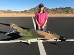 Pilot Evelyn and her new favorite toy.