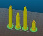 Tall part split into multiple pieces. Brims were added to increase surface adhesion to the build plate