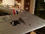 Positioned where the tanks usually mount to protect aileron servos