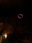 I drew the pink circle to show where the Night Vapor landed. Ita that point of light up in the neighbors tree.