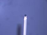 Shave two side of the lead down so that it looks like a flat head screwdriver.