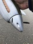 Hit stall speed a touch early, caused the wing to dip, catch in the hard frozen snow and snap off the prop.