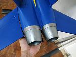Plastic molded nozzles with two-tone factory paint.