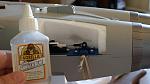 My cure for the right side. A little clear Gorilla Glue and a #64 rubber band to clamp it in place while the glue cures.