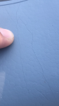 Hairline cracks in paint