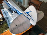 Tail surfaces mounted and hinged