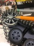how is this attached?  Glue?  Not sure how much load is on it.