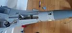 Airplane was cut in half, at the leading edge base, all gear got damaged (gear down crash)