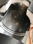 You can see the thrust tube starts at the aft end of hatch opening