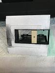 Lower hatch with retainer