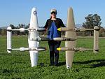 RC Pilot Evelyn holding the Flightline RC P-38s. Note-Bare metal foil was applied to the silver Lightning by Alpha.