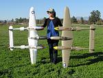RC Pilot Evelyn holding the Flightline RC P-38s. Note-Bare metal foil was applied to the silver Lightning by Alpha.