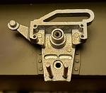 Two screw locations in inner suspension piece