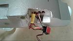 this was a mess. I ended up heat shrinking these wires then pushing that into the opening in the wing