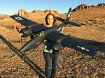 RC Pilot Evelyn holding the FightlineRC 1600mm F7F-3 Tigercat