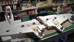 I decided to start with the main wing first. Here the servos are tested and centered.