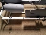 I used 3/4`` pipe mounted to the side for wing tube storage.