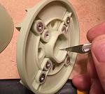 Scraping any areas that were binding from shaft shoulder.