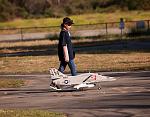 Evelyn walking with her new favorite Freewing jet.