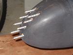 Nose is balsa blocks with 3/4 oz fiberglass cloth. The guns are brass and aluminum tubes